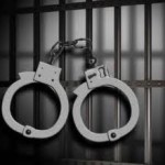 Handcuffs in Jail Cell
