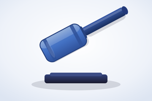 Judge’s gavel resting on a sound block