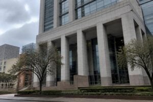 The exterior of a Harris County criminal justice building downtown on a gray morning