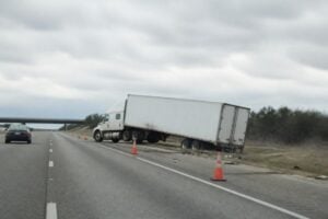 Jackknifed 18-wheeler on a Texas freeway shoulder