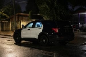 Police patrol SUV parked on a Houston street at night